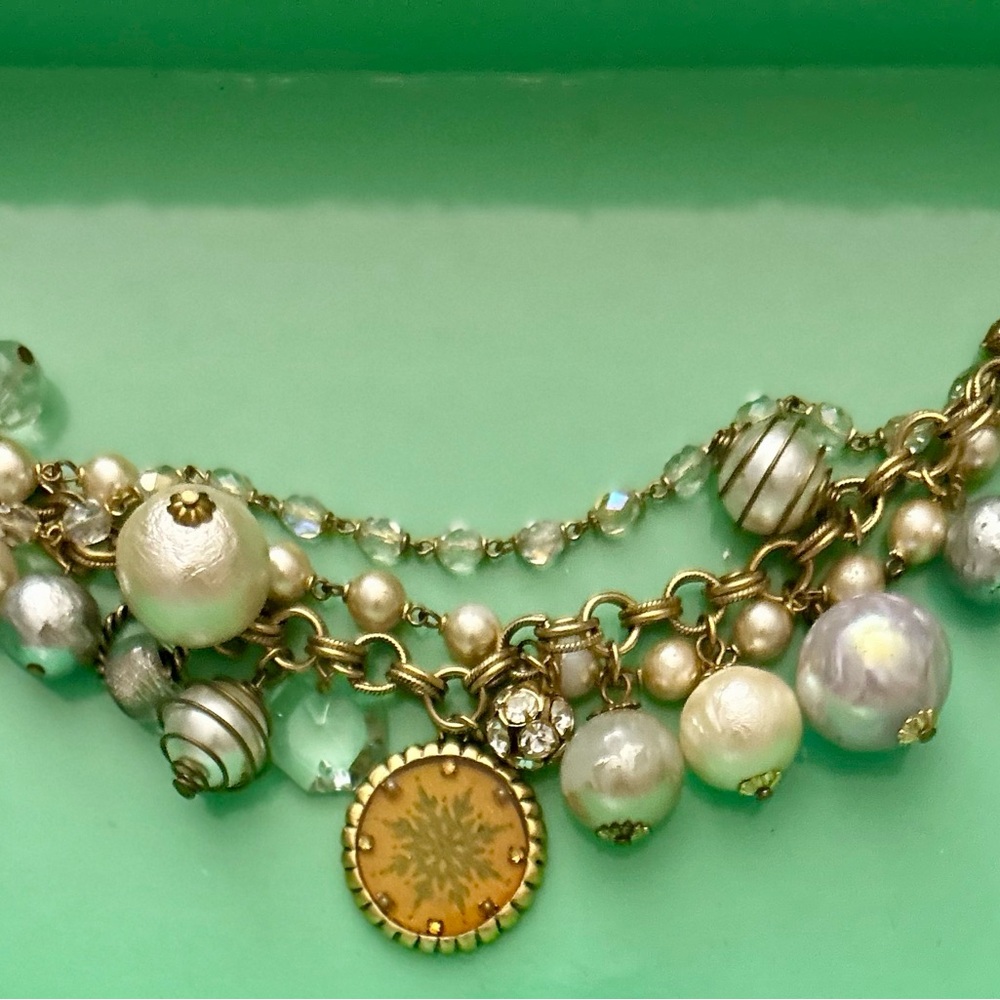Elegant Gold and Silver Charm Necklace
